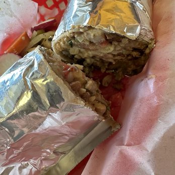 Tepa Taqueria signature dishes Super BurritoNachos FriesOrchata